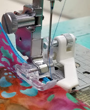 Load image into Gallery viewer, Creative Feet Satinedge Foot Edge Stitching Closeup with needle, fabric and thread