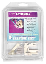 Load image into Gallery viewer, Creative Feet Satinedge Sewing Machine Presser Foot inside it's package showing what's included. The foot, 4 snap-on adapters, and illustrated instruction booklet