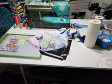 Load image into Gallery viewer, Plaid Fabric Creations Soft Fabric Inks sewing table covered in fabric ink paintings