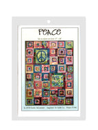 A packaged quilt pattern with the title 'PEACE' displayed on the cover, featuring a colorful quilt design with peace symbols.